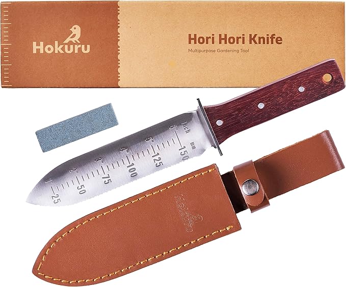 Hokuru hori-hori knife with leather sheth and sharpening stone.