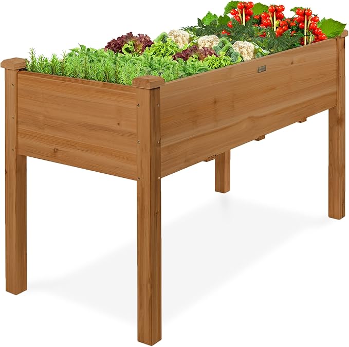 Raised wooden garden bed colored acorn brown.